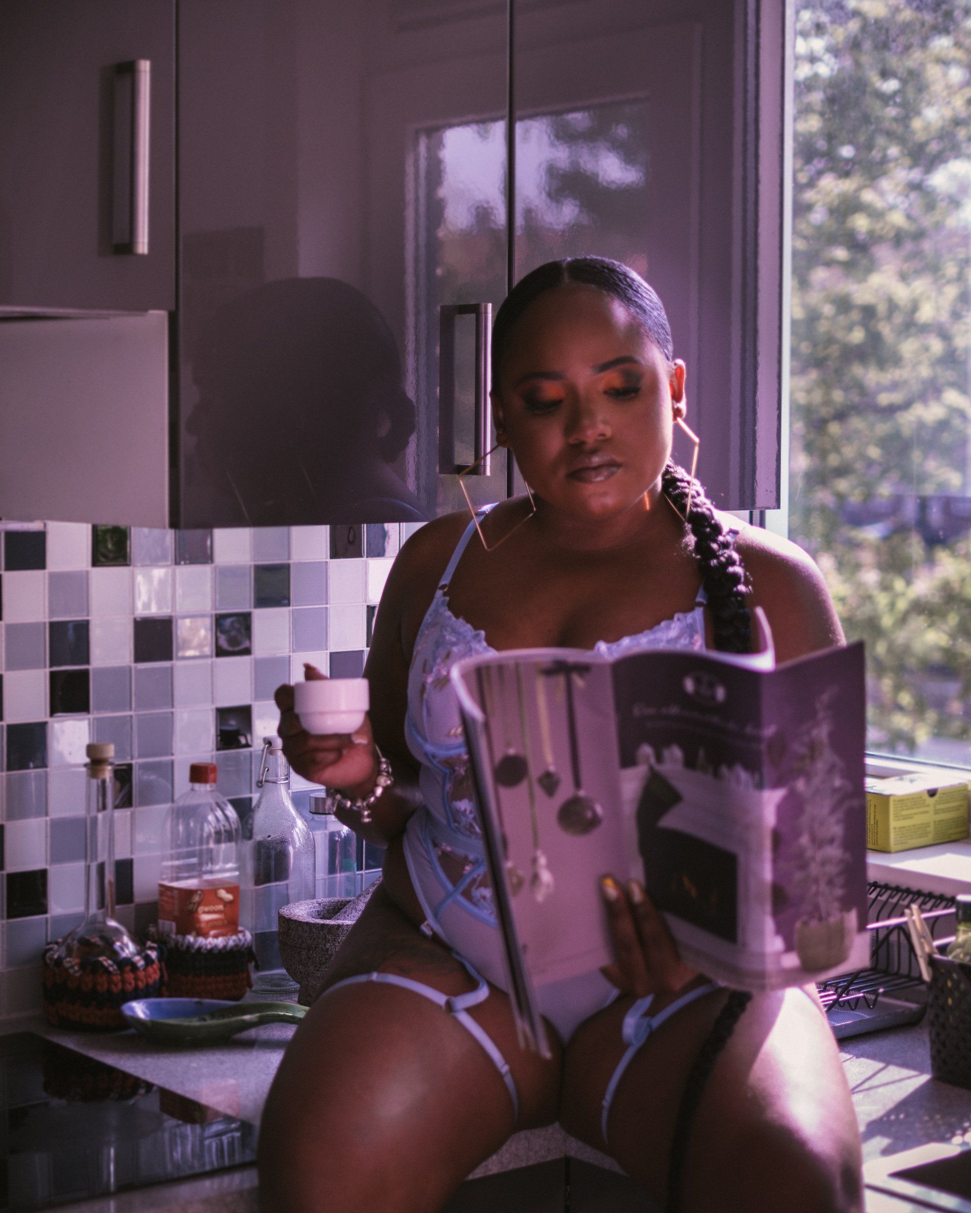 sexy girl in a kitchen wearing lingerie