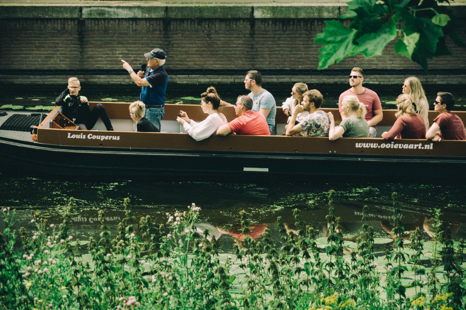 People commuting on a boat in Den haag the netherlands
