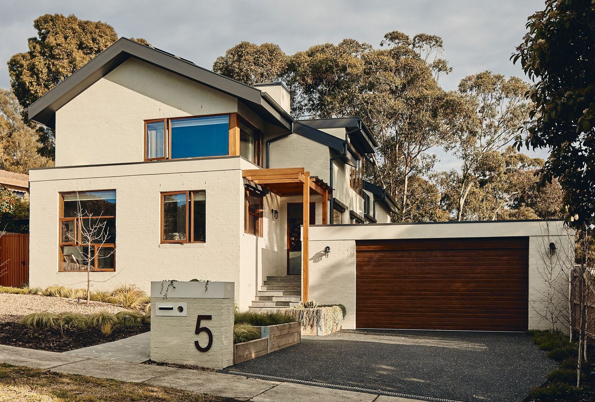 A white house with the number 5 on the front of it