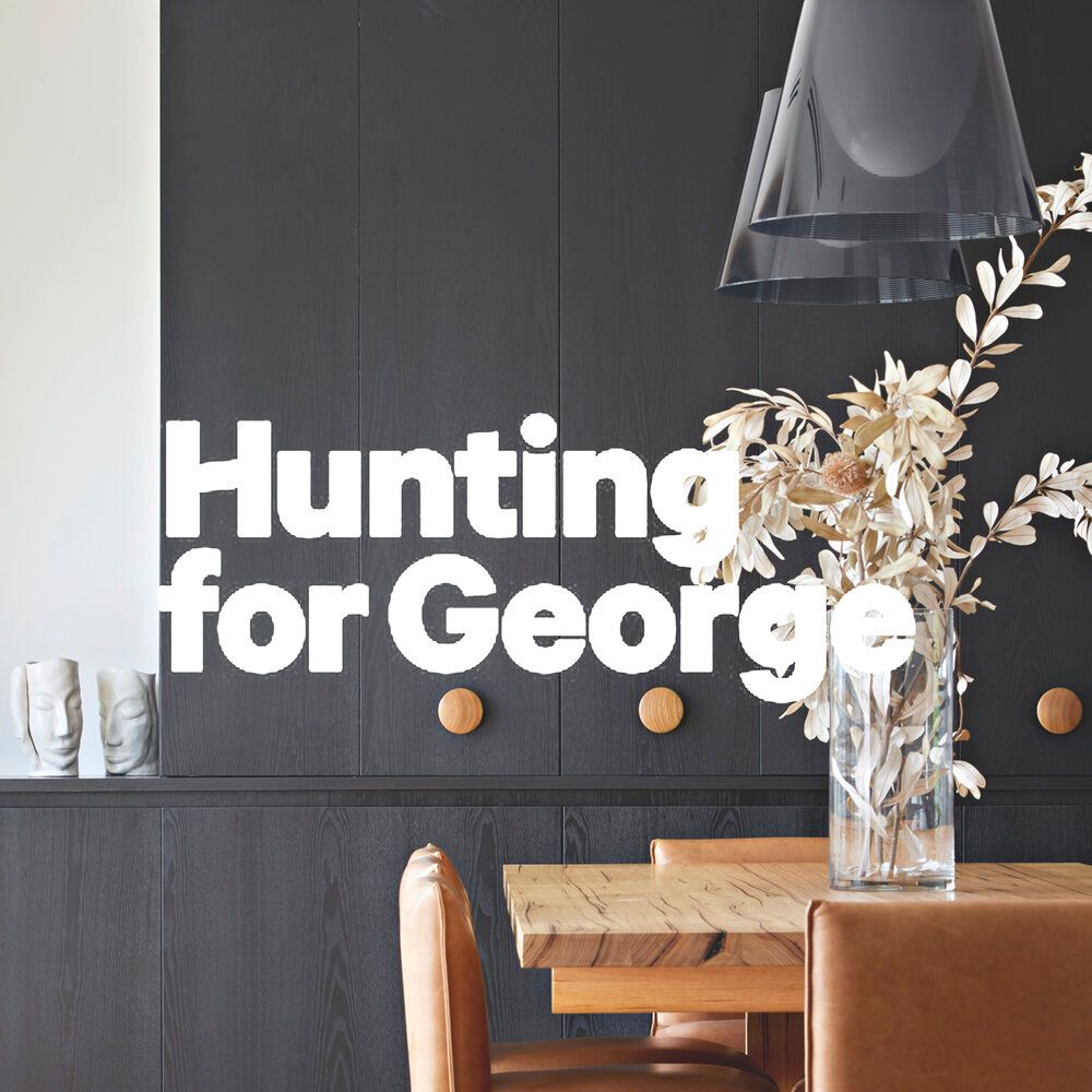 A dining room with the words hunting for george on the wall