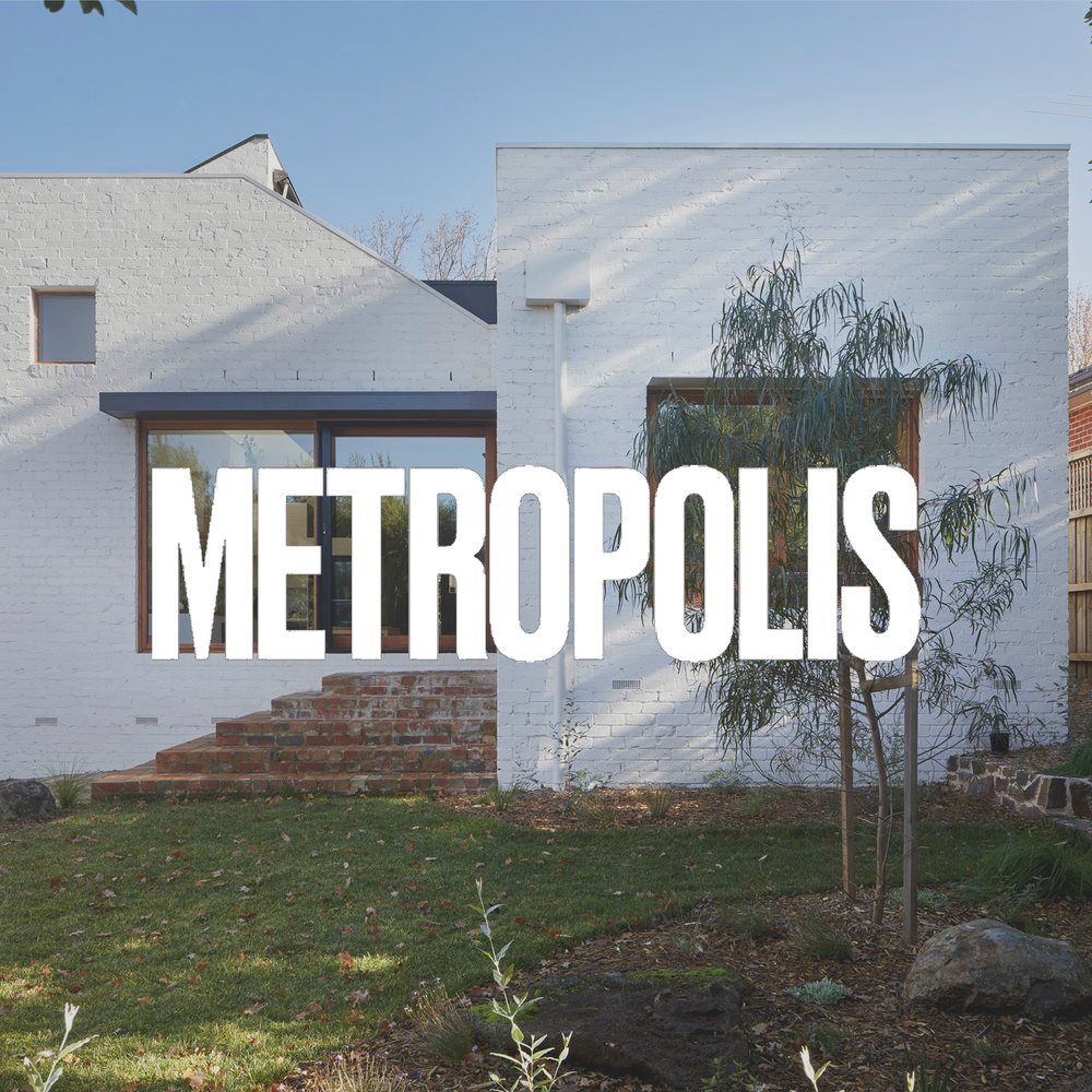 A white building with the word metropolis on it