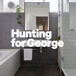 A bathroom with a bathtub , sink , mirror and shower.