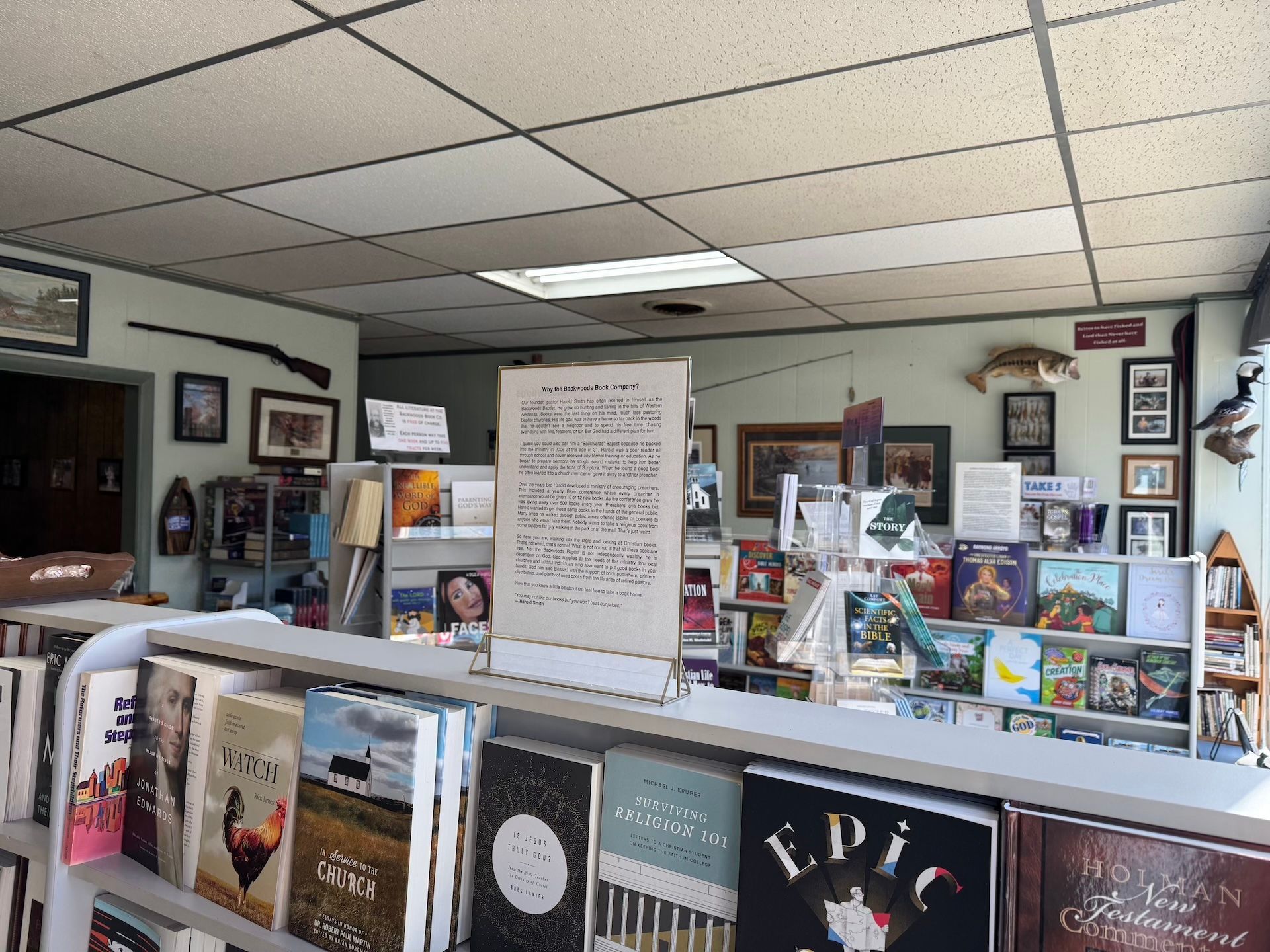 a view of the backwoods bookstore showing decor and books on shelves