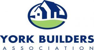 Logo for York Builders Association Logo Logo for York Builders Association: houses inside an oval with green and blue elements, text below.
