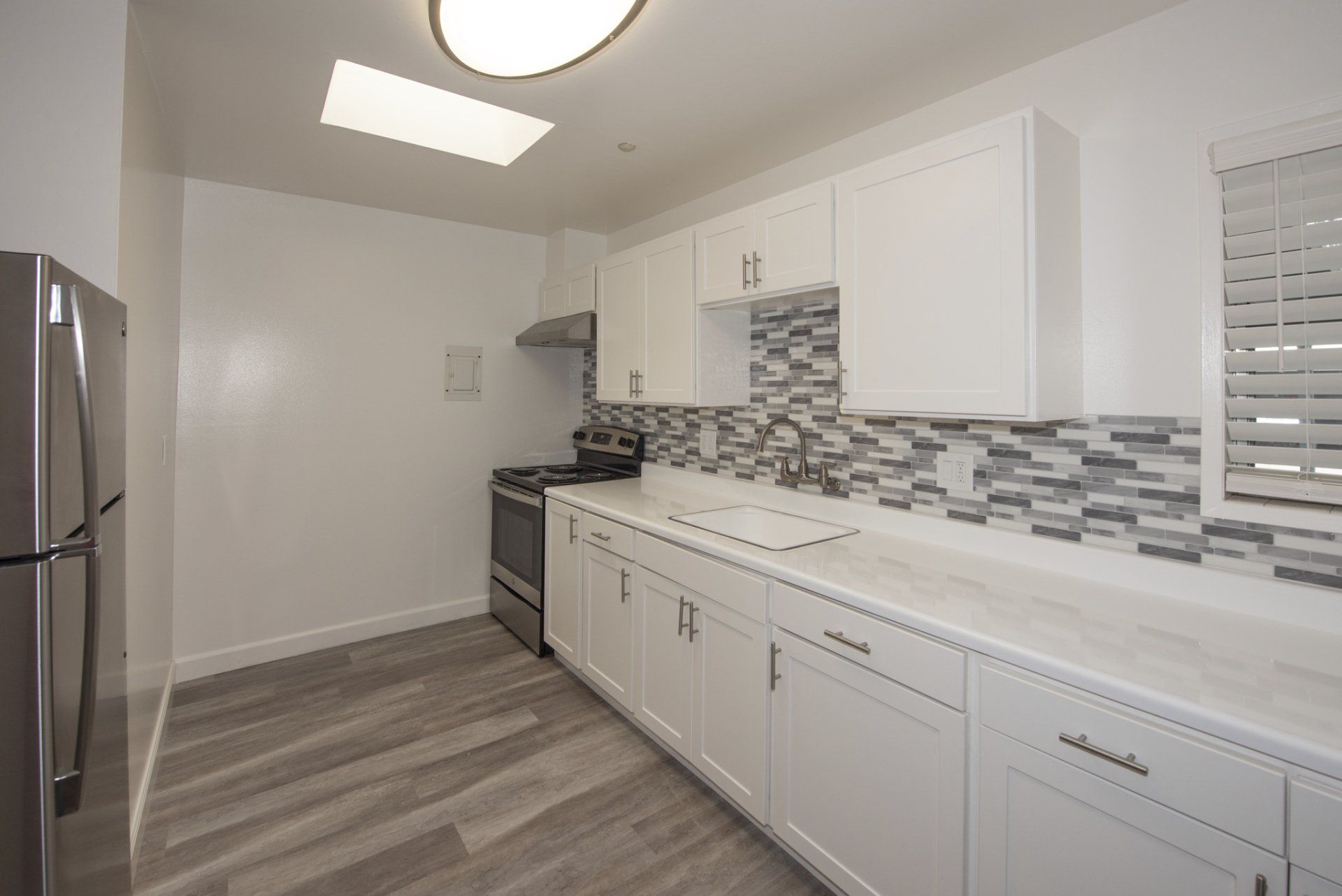 Updated kitchen with stainless steel appliances