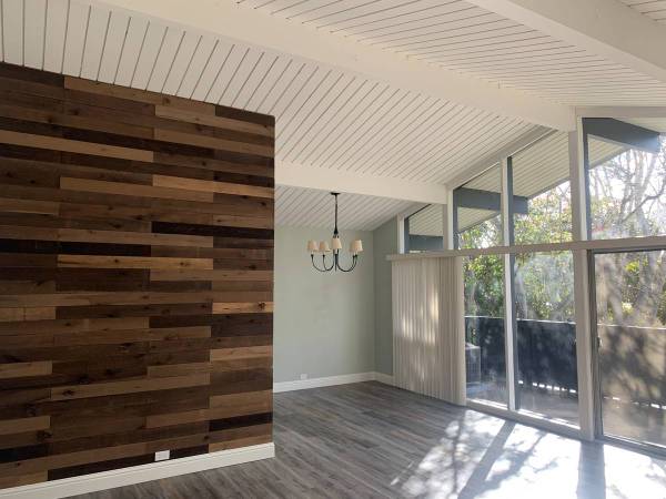 Interior of home with dining area with modern grey flooring