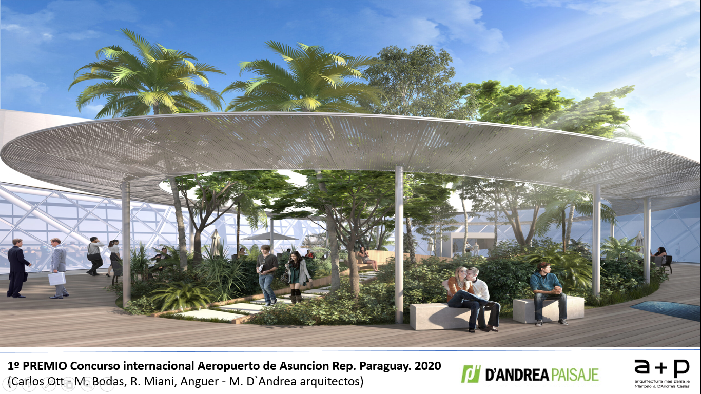 Un grupo de personas está sentada bajo un dosel en un parque.