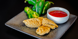 Crispy jalapeño poppers stuffed with creamy cheese, served with a side of sweet chili sauce. Perfectly bold, crunchy, and crave-worthy.