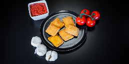 Crispy, golden-brown ravioli filled with cheesy goodness. Served with a side of zesty marinara for dipping perfection.