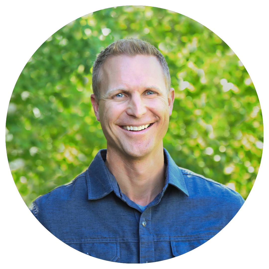 Brandon Lake of Resmark headshot - a man standing in front of trees
