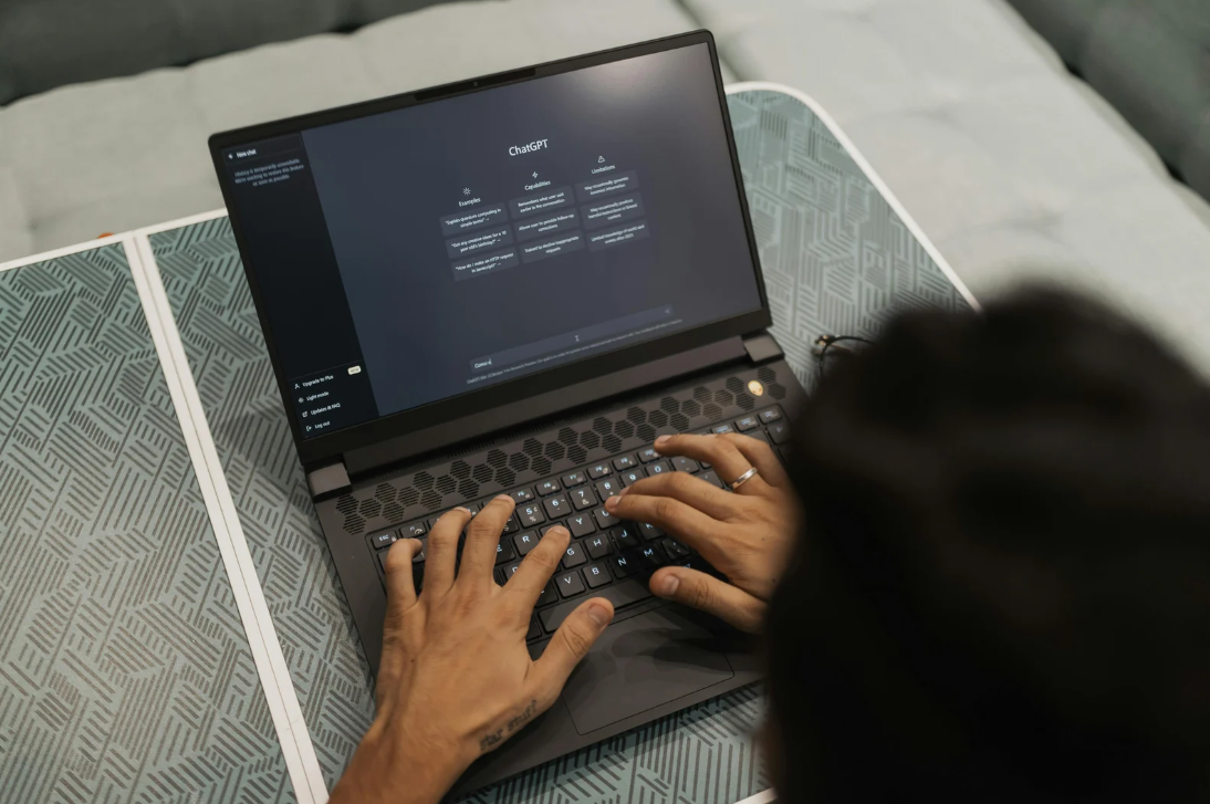 a person on a computer using chatgpt