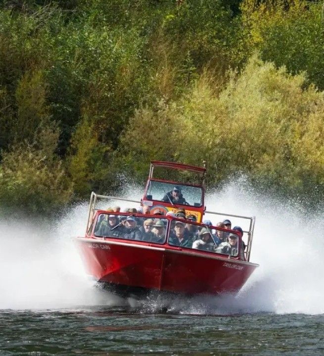 Red boat on a river