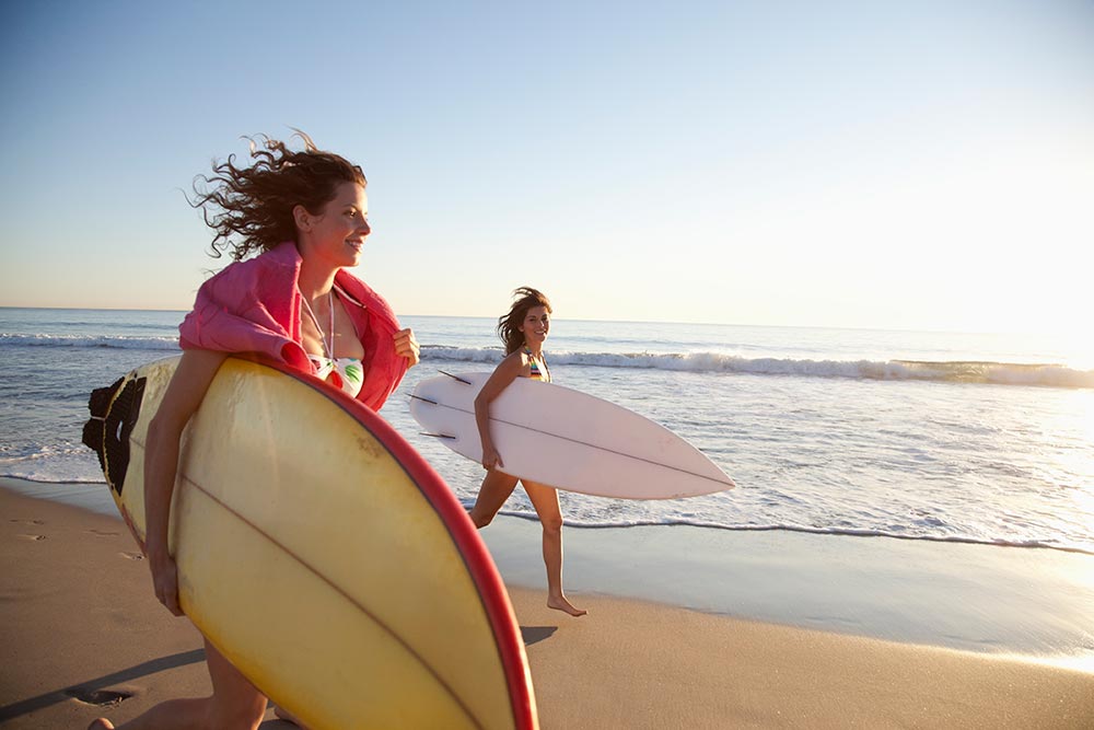Women going surfing