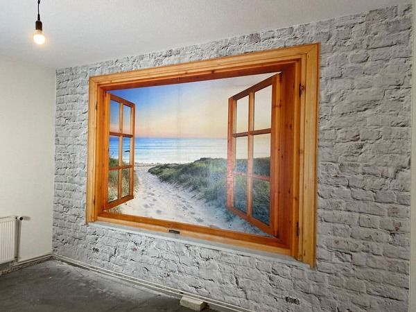 Wandgestaltung mit Motivtapete: Fenster öffnet sich zum Strand