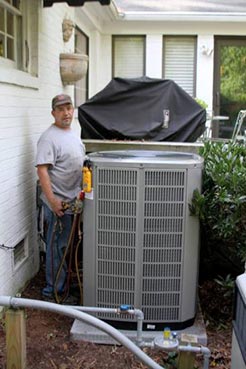 Technician Installing New Air Conditioning Unit — Air Conditioning Repair in Newport News, VA
