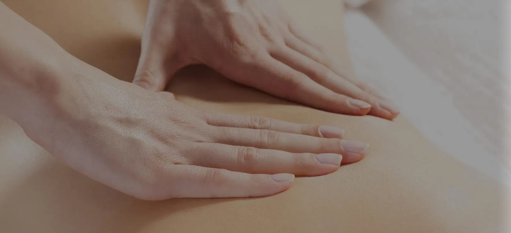 Massage Therapist treating patient