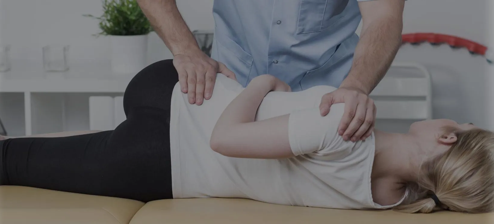 Osteopath treating patient