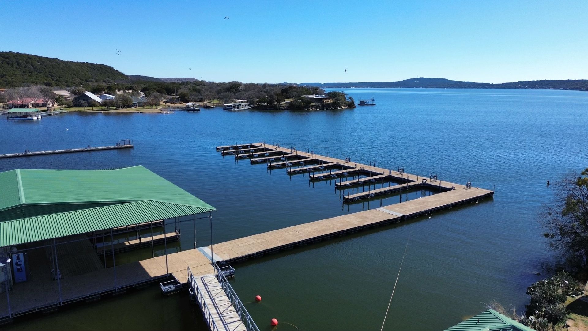 An aerial view of a marina on a lake