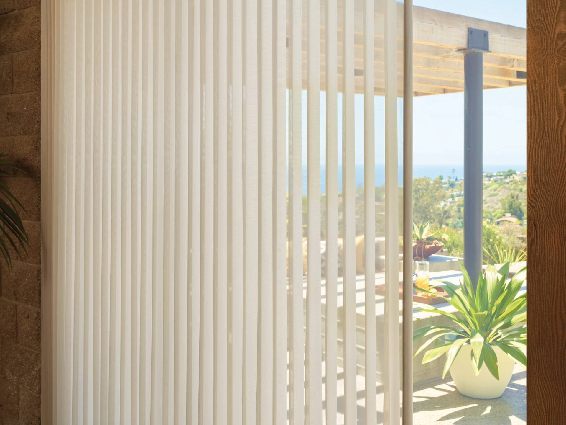 Hunter Douglas Luminette® Sheer Panels on sliding glass doors near Kalaheo, Hawaii