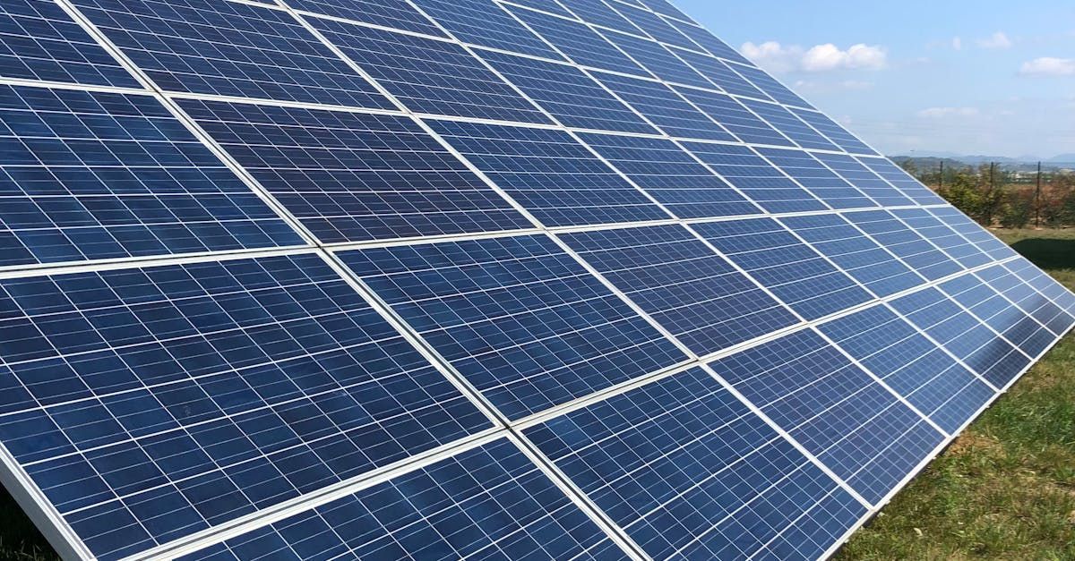 Ground-mounted solar array installed on a property in Hudson, NH for energy independence.