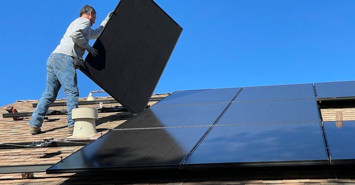 Dracut Solar team performing a solar installation in Hudson, NH.