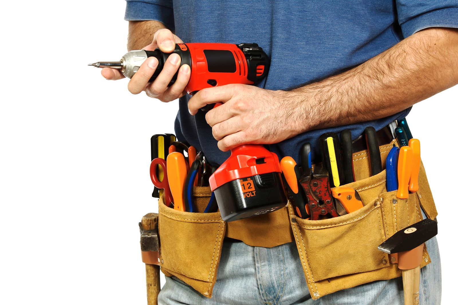 Two men are working on a washing machine and a refrigerator in a garage.