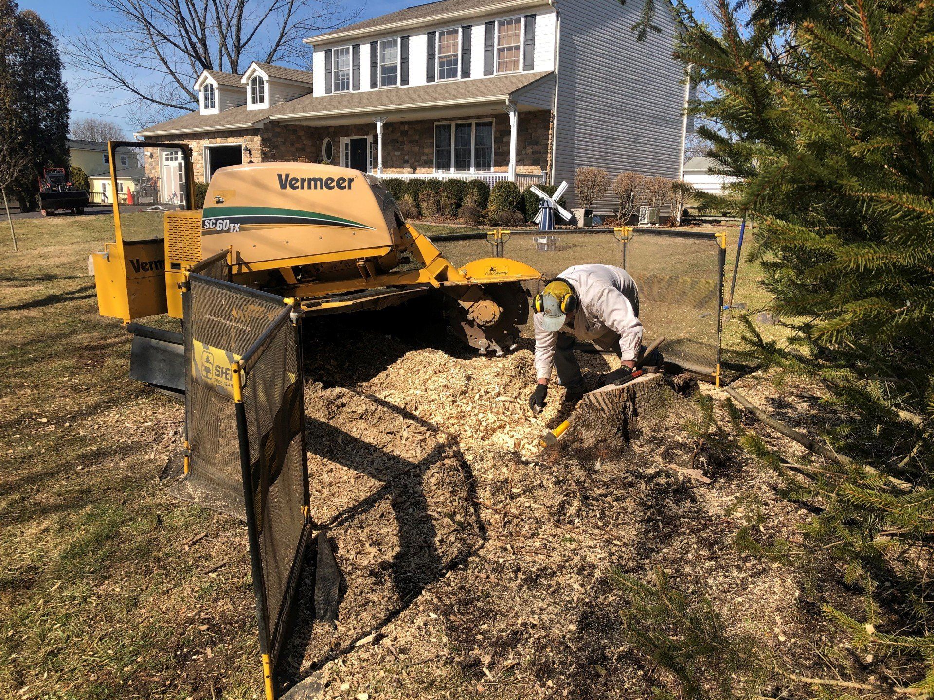 A Tree Stump Being Removed By A Tree Stump Shredder — Coopersburg, PA — Hungry Beaver Tree Service