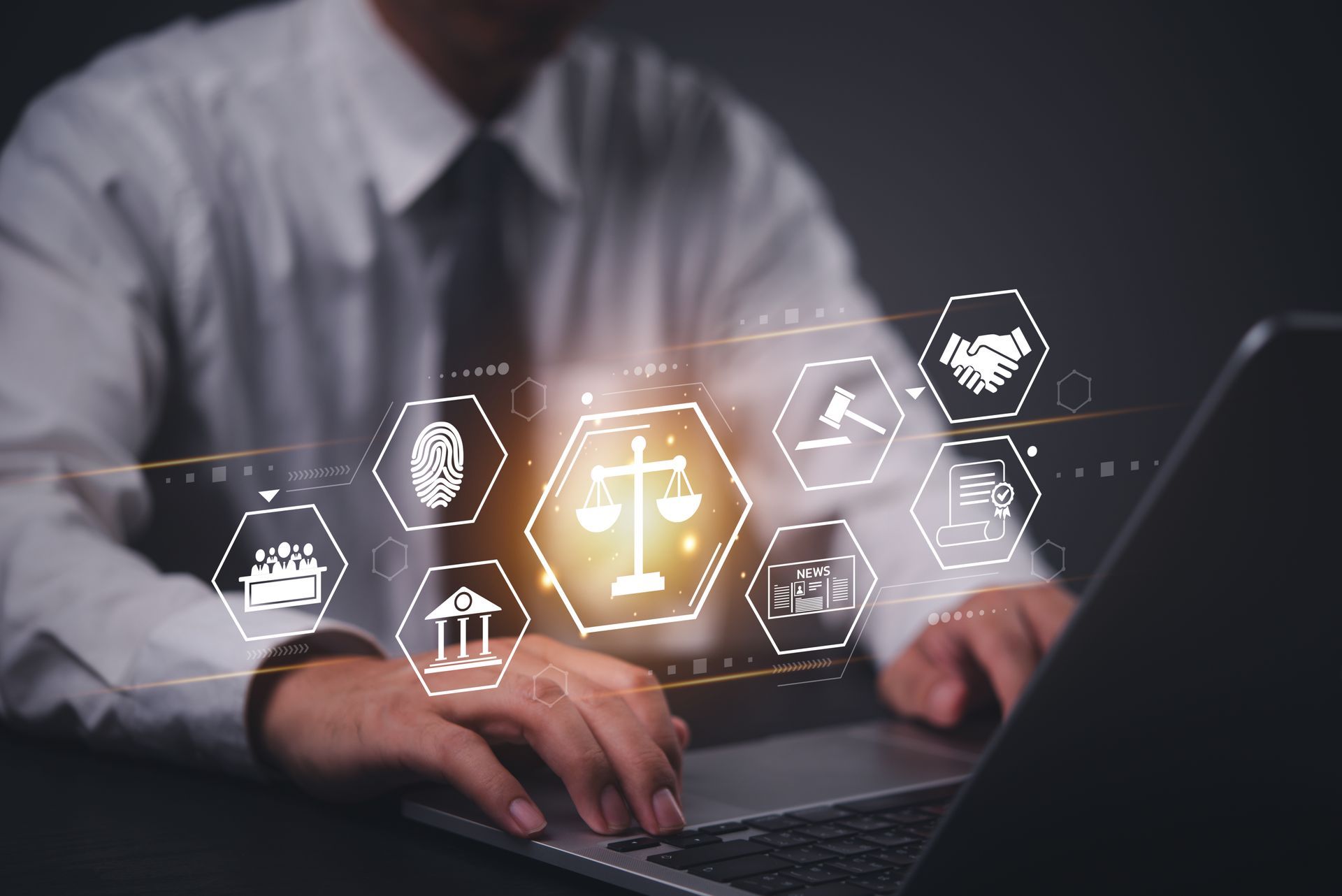 Digital marketing is one of the smartest investments you can make for a small business! A man in a white shirt and tie is typing on a laptop computer. P3 Digital Marketing helping small legal services businesses
