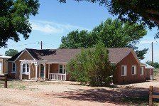 SOLD:  Valley Home on 15 irrigated acres, horse stalls, barns, etc.