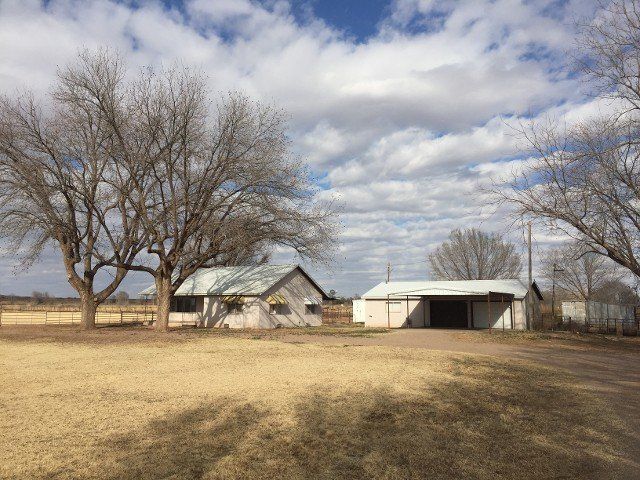 SOLD:  Valley Home on 15 irrigated acres, horse stalls, barns, etc.