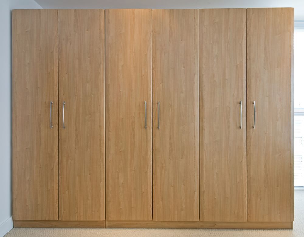 A Walk in Closet With Lots of Shelves and Drawers — Wardrobe World In Paget, QLD