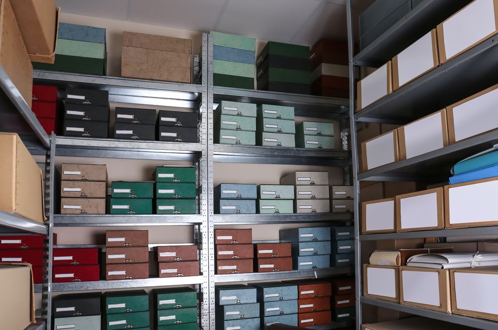 A Warehouse Filled With Lots of Boxes and Shelves — Wardrobe World In Paget, QLD