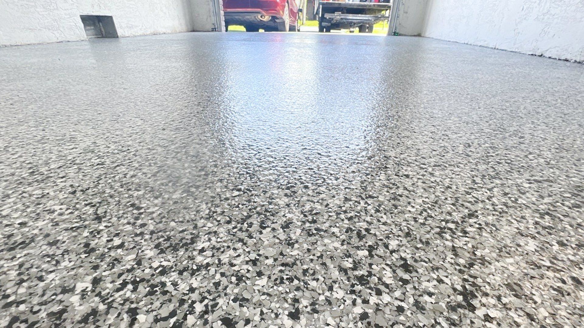 Update Your Garage With A Premium Concrete Coated Floor from 24 Hour Floor