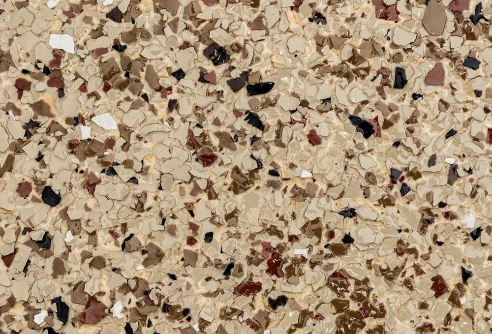 A close up of a floor with a lot of small rocks on it.