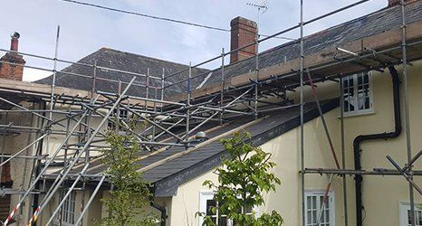 We offer comprehensive slate and tile roofing services
