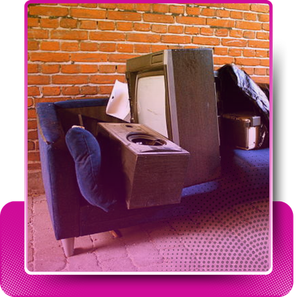 A pile of discarded furniture with pink fade gradient and a rectangular shape behind it.