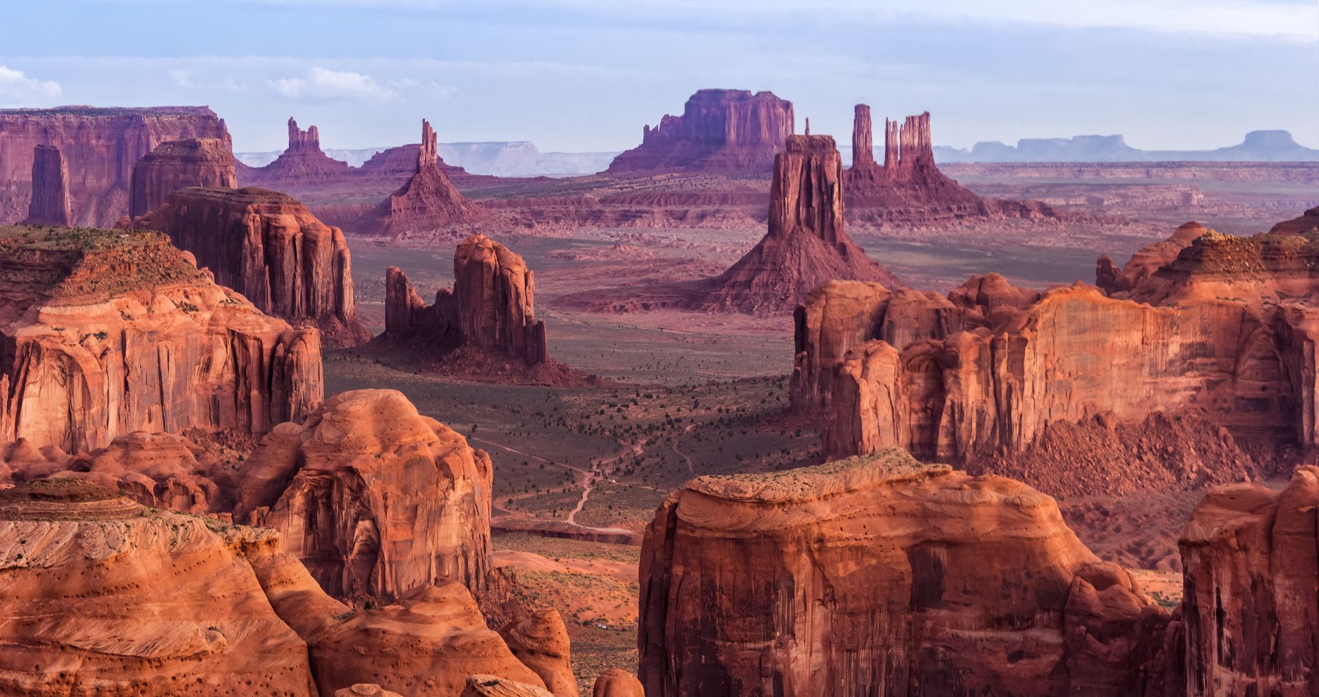 A desert landscape with a lot of rocks and mountains