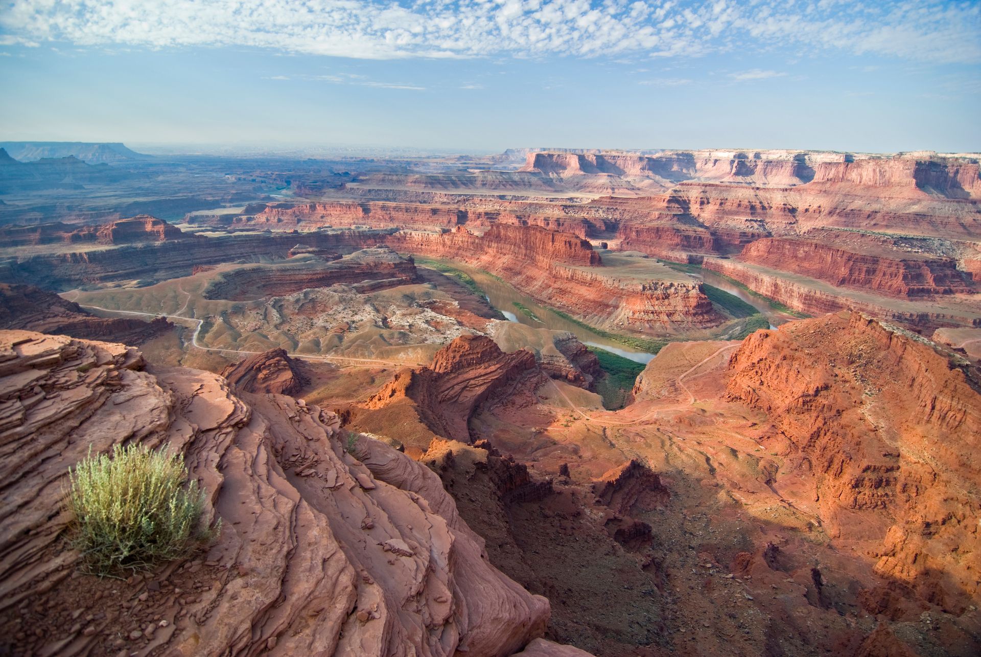 A view of a canyon from the top of a mountain.