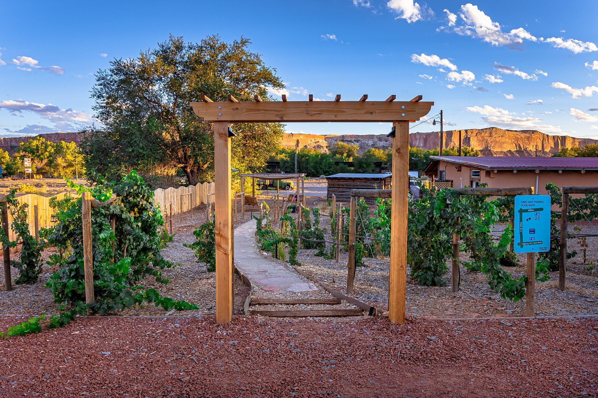 A mobile home with a large porch and stairs