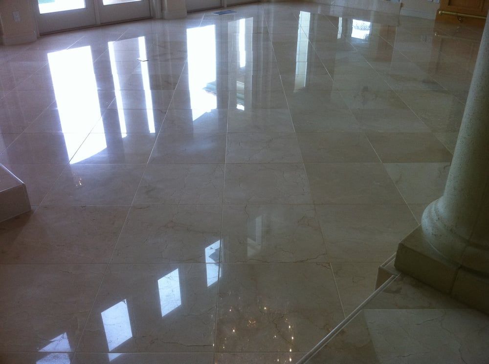 The picture is of a glossy family room floor polished with a very glossy finish.