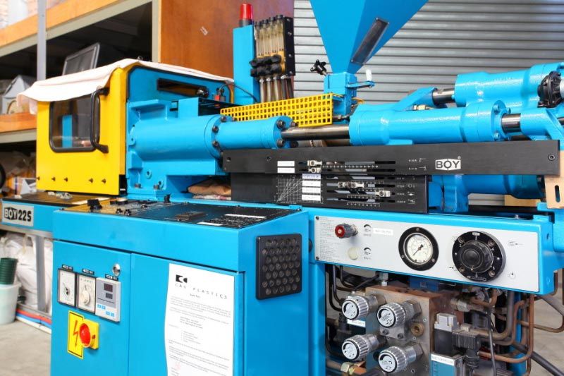 blue and yellow boy225 custom moulding machine