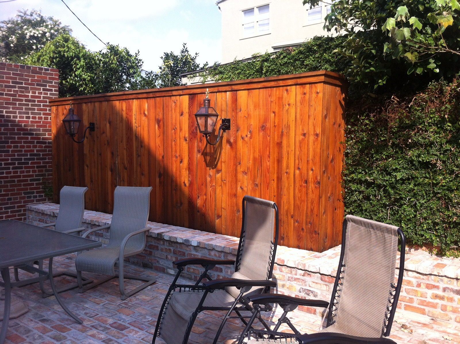 Brown Wooden Fence — Metairie, LA — Louisiana Ornamental Ironworks & Fencing