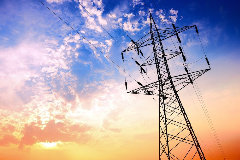 Power Lines Tower Against a Sky of Blue — Australian Mobile Welding Pty Ltd in Atherton, QLD
