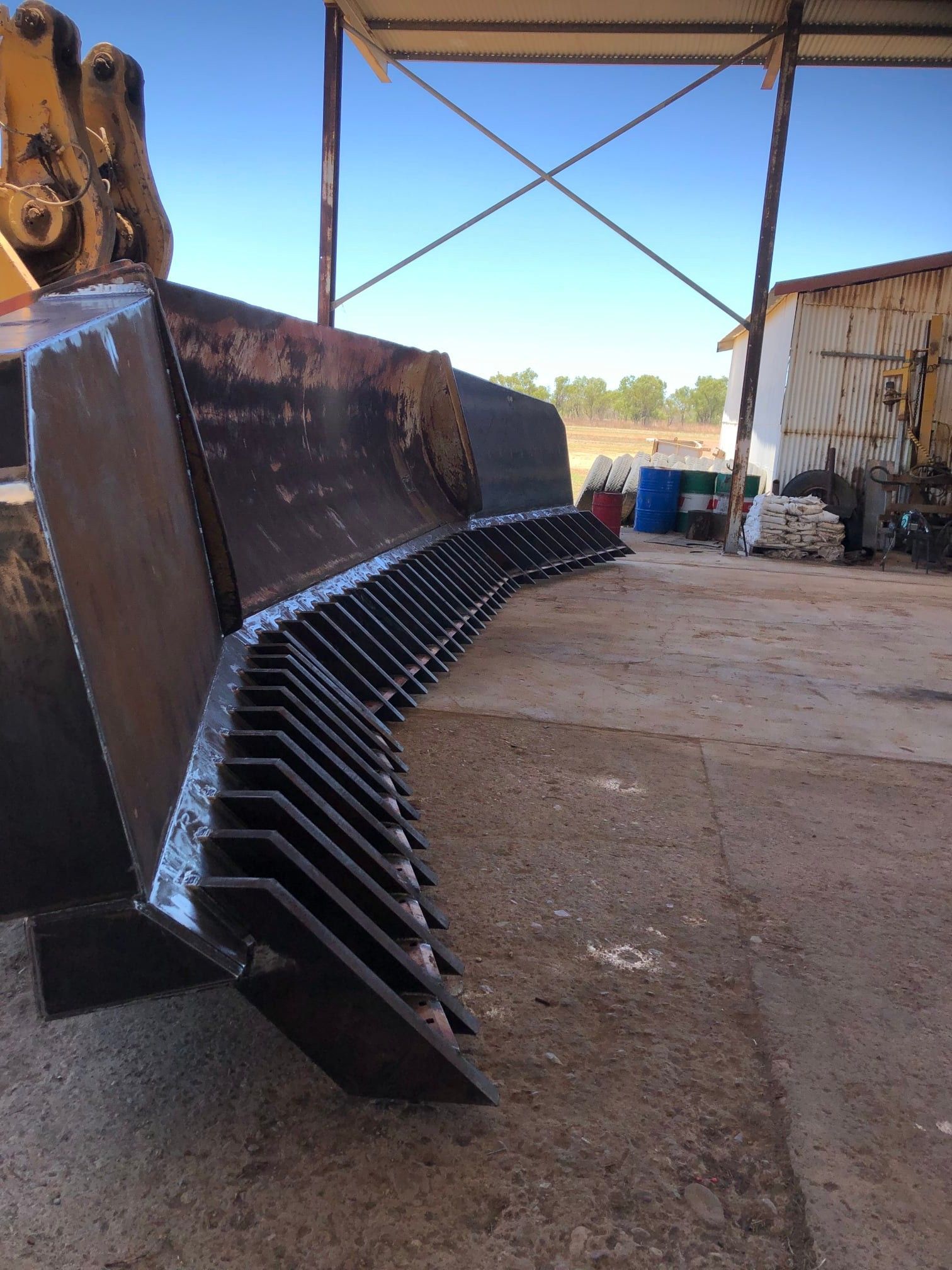 A Heavy-duty Excavator Bucket With Welded Teeth — Australian Mobile Welding Pty Ltd in Atherton, QLD