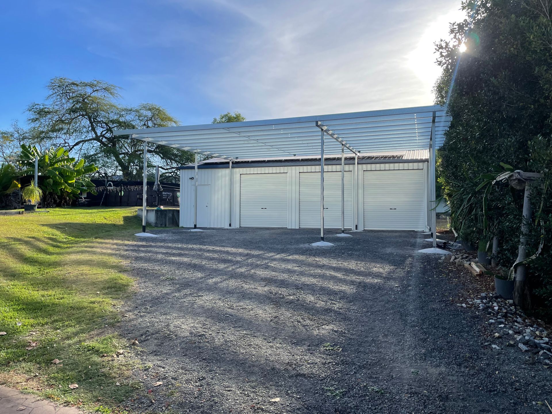 Steel I-beams arranged on the ground, likely at a construction site, with a dark, metallic appearance — Australian Mobile Welding Pty Ltd in Atherton, QLD