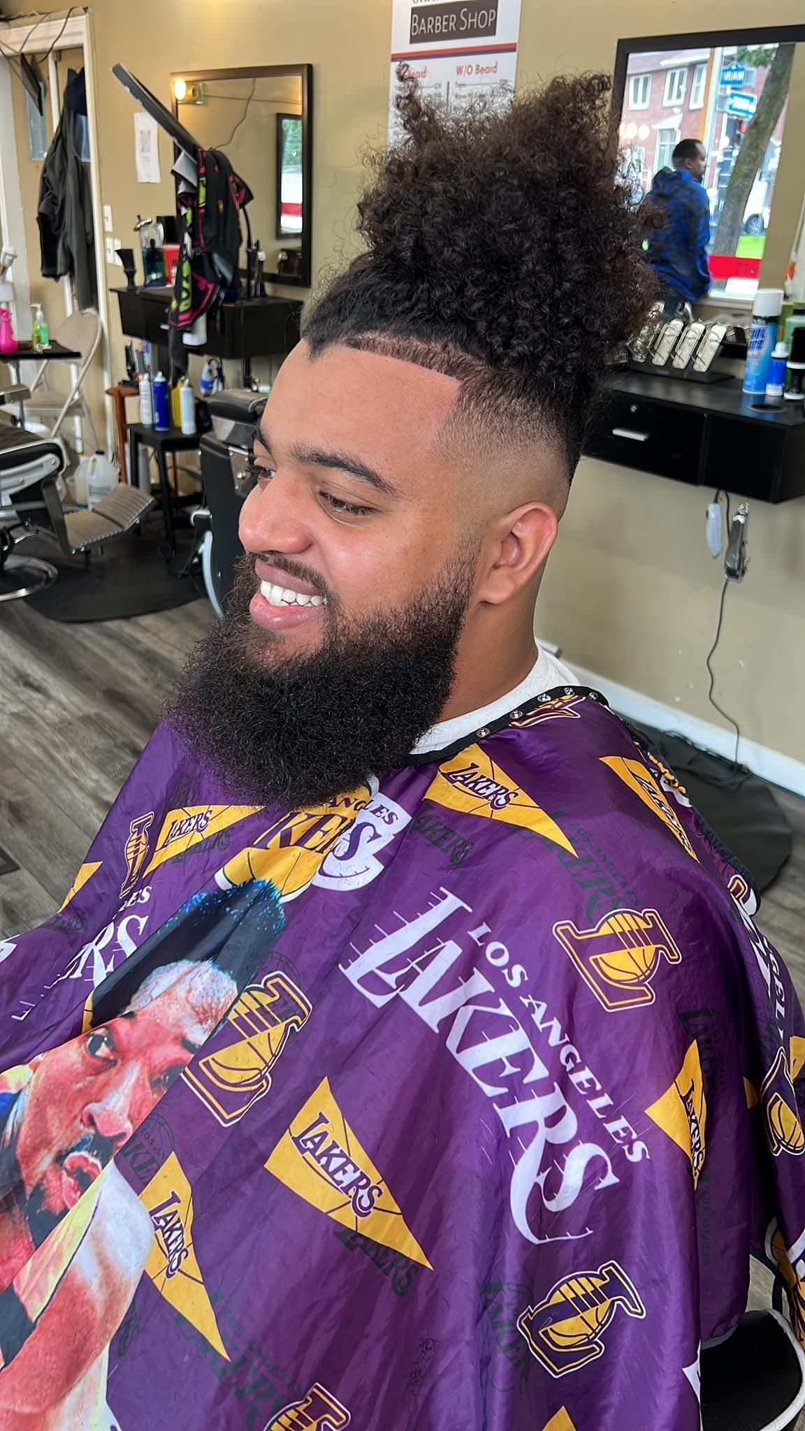 happy man with skin fade hair cut
