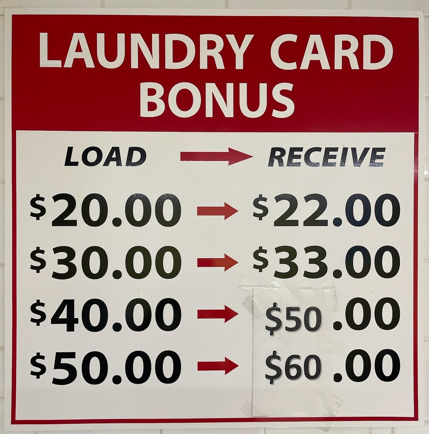 A sign that says laundry card bonus on it with all the bonus.