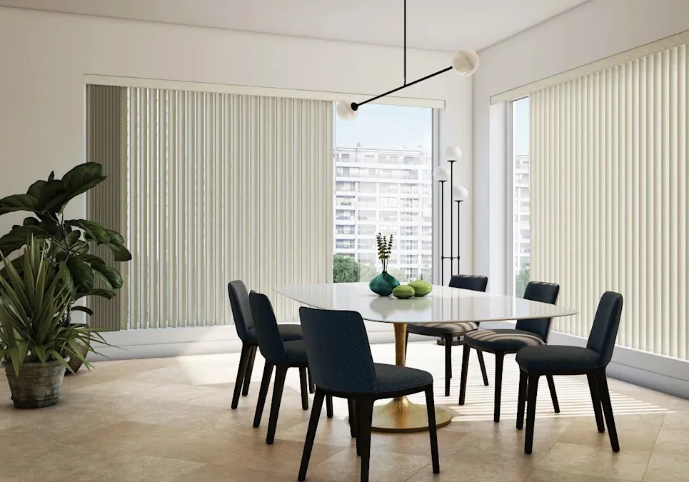 Contemporary dining room with vertical blinds covering two large windows.