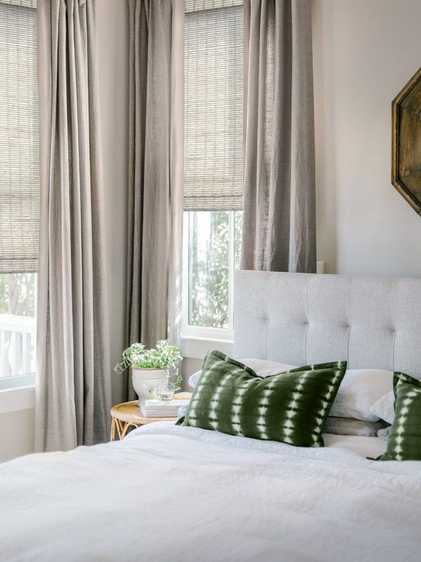 White custom shades on a set of a windows in a chic living room near Cumming, GA