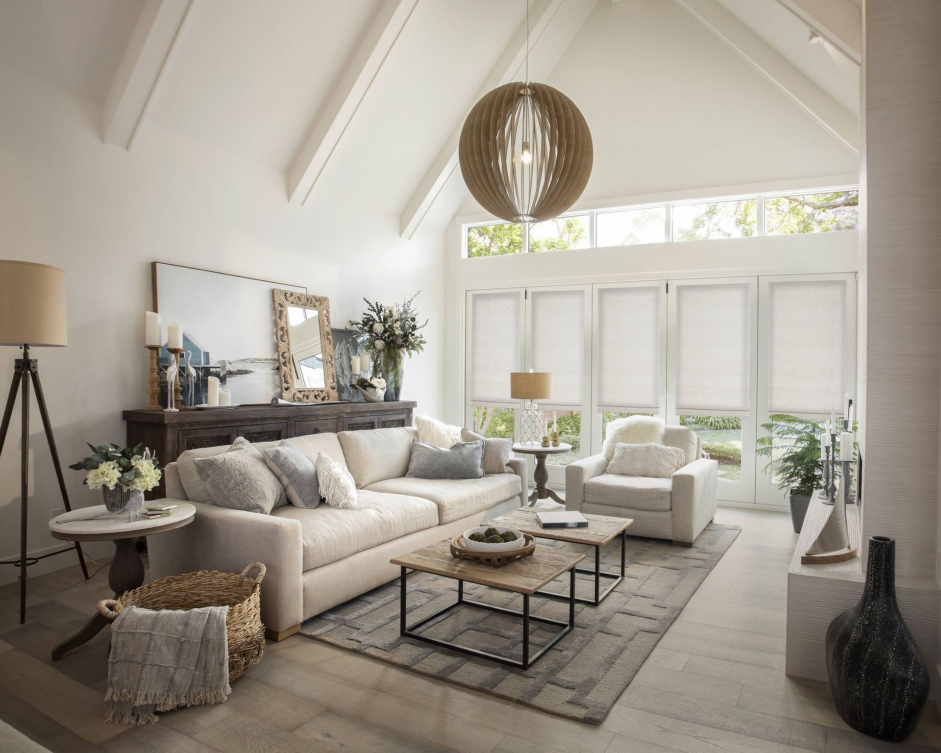 White custom shades on a set of a windows in a chic living room near Cumming, GA